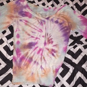 Tye-dye shirt. Pink, blue, purple, and white.